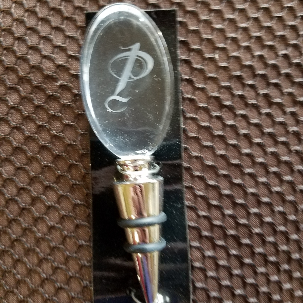 Clear intial P wine stopper